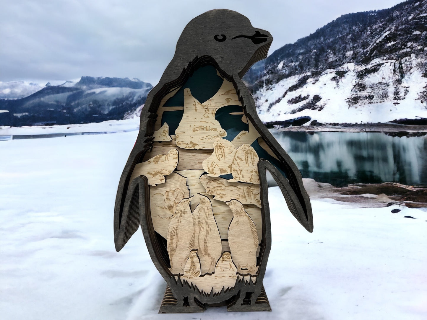 Caja de sombras 3D iluminada por pingüinos